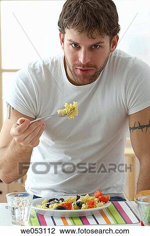 Stock Image - 30's, at-home, 20's. Fotosearch