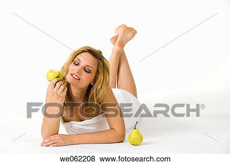 Stock Photo - 30's, attractive, attitude, apple, 20's. Fotosearch