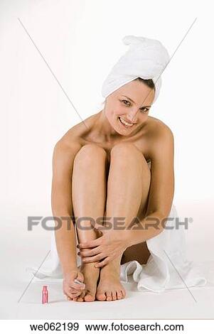 Stock Photo - 30's, barefoot, attractive, attitude, 20's. Fotosearch
