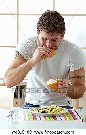30's, biting, bite, at-home, 20's View Large Photo Image Stock Photo - 30's, biting, bite, at-home, 20's. Fotosearch