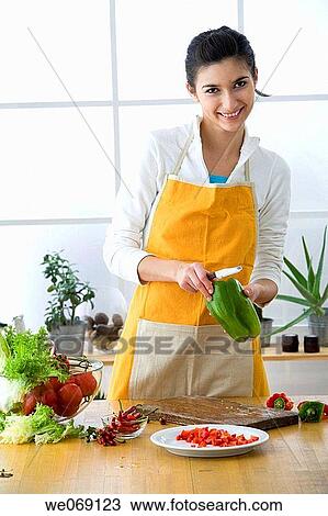 Stock Image - 30's, board, at-home, apron, 20's. Fotosearch