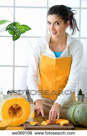 Stock Photo - 30's, board, at-home, apron, 20's. Fotosearch