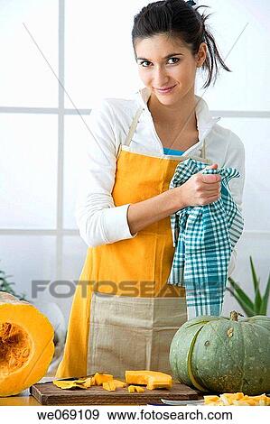 Stock Photo - 30's, board, at-home, apron, 20's. Fotosearch