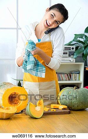 Stock Photograph - 30's, board, at-home, apron, 20's. Fotosearch