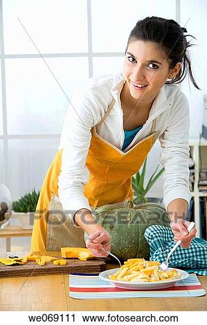 30's, brunette, at-home, apron, 20's View Large Photo Image Stock Image - 30's, brunette, at-home, apron, 20's. Fotosearch
