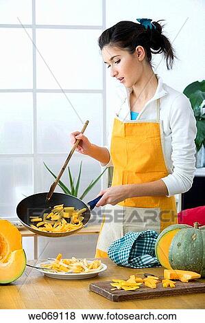 30's, brunette, at-home, apron, 20's View Large Photo Image Stock Photo - 30's, brunette, at-home, apron, 20's. Fotosearch