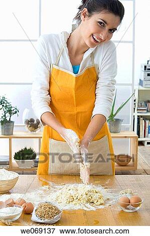 30's, brunette, at-home, apron, 20's View Large Photo Image Stock Photo - 30's, brunette, at-home, apron, 20's. Fotosearch