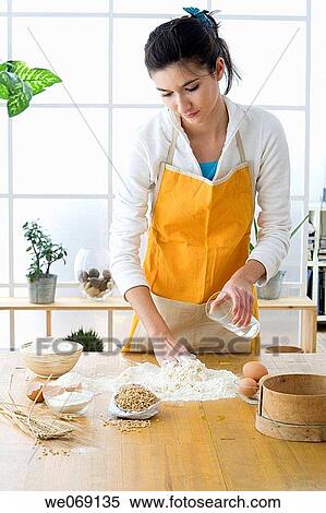 30's, brunette, at-home, apron, 20's View Large Photo Image Stock Photography - 30's, brunette, at-home, apron, 20's. Fotosearch