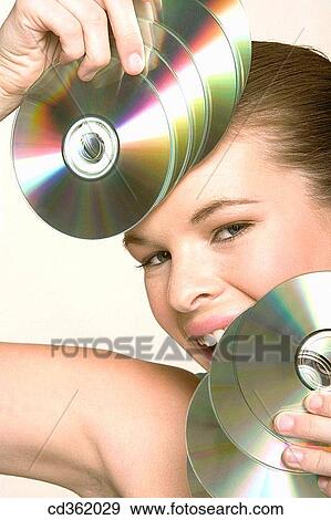 30's, CD, brunette, 20's View Large Photo Image Stock Photo - 30's, CD, brunette, 20's. Fotosearch