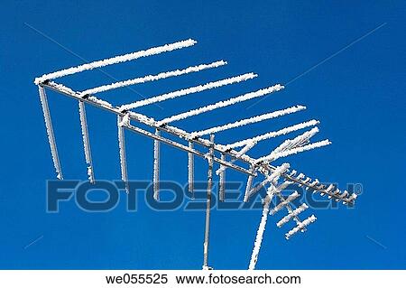 Stock Photography - A television antenna covered with frost.. Fotosearch