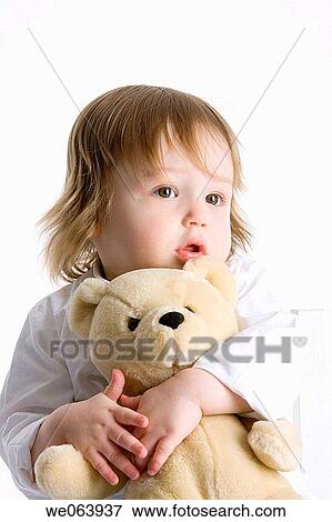 Stock Photo - absent-mindedness, child, baby, absorbed, Absent-minded. Fotosearch