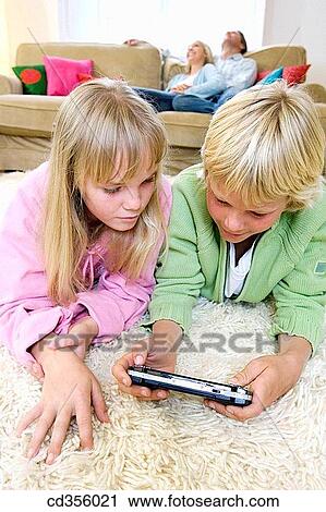 addiction, at-home, amusement, ability View Large Photo Image Stock Image - addiction, at-home, amusement, ability. Fotosearch