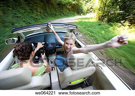 amusement, automobile, Arms raised, Arms open, 20's View Large Photo Image Stock Image - amusement, automobile, Arms raised, Arms open, 20's. Fotosearch