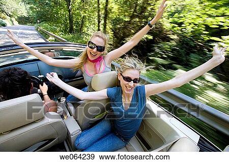 amusement, automobile, Arms raised, Arms open, 20's View Large Photo Image Stock Photo - amusement, automobile, Arms raised, Arms open, 20's. Fotosearch