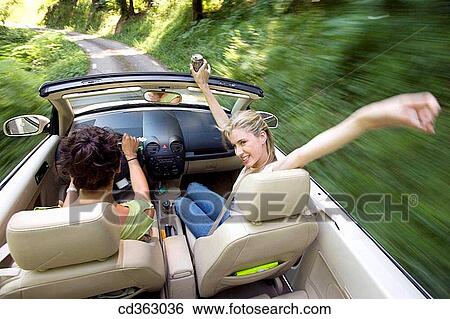Stock Photograph - amusement, automobile, Arms raised, Arms open, 20's. Fotosearch