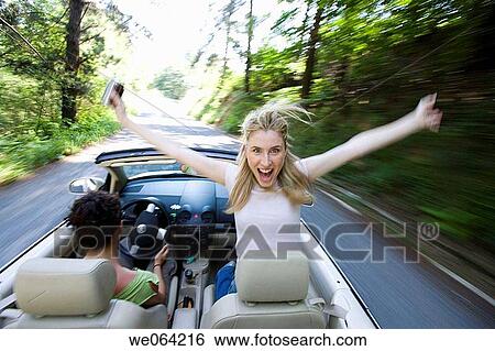 amusement, automobile, Arms raised, Arms open, 20's View Large Photo Image Stock Photograph - amusement, automobile, Arms raised, Arms open, 20's. Fotosearch