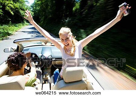 Stock Photography - amusement, automobile, Arms raised, Arms open, 20's. Fotosearch