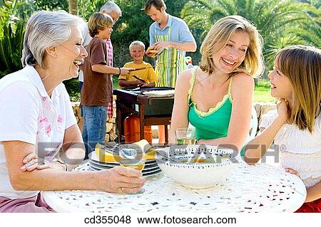 amusement, barbeque, barbecue, 3 generations View Large Photo Image Stock Photo - amusement, barbeque, barbecue, 3 generations. Fotosearch