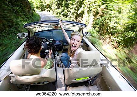 amusement, blurred motion, automobile, Arms raised, 20's View Large Photo Image Stock Image - amusement, blurred motion, automobile, Arms raised, 20's. Fotosearch