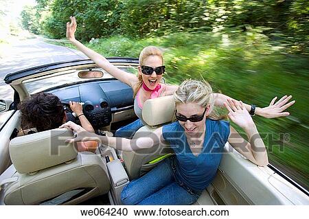 amusement, blurred motion, automobile, Arms open, 20's View Large Photo Image Stock Image - amusement, blurred motion, automobile, Arms open, 20's. Fotosearch