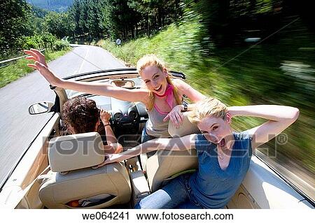 amusement, blurred motion, automobile, Arms open, 20's View Large Photo Image Stock Image - amusement, blurred motion, automobile, Arms open, 20's. Fotosearch