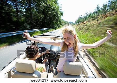amusement, blurred motion, automobile, Arms open, 20's View Large Photo Image Stock Photo - amusement, blurred motion, automobile, Arms open, 20's. Fotosearch