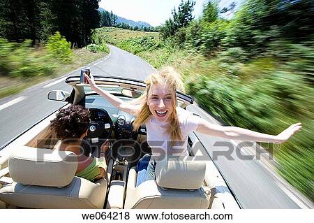 amusement, blurred motion, automobile, Arms open, 20's View Large Photo Image Stock Photo - amusement, blurred motion, automobile, Arms open, 20's. Fotosearch