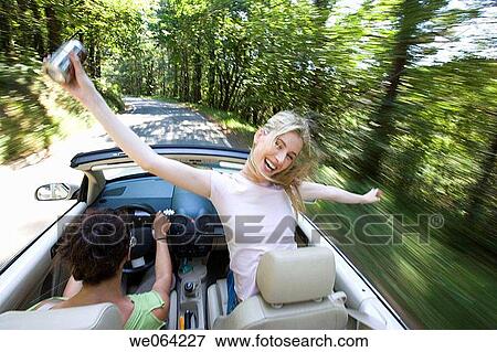 amusement, blurred motion, automobile, Arms open, 20's View Large Photo Image Stock Photo - amusement, blurred motion, automobile, Arms open, 20's. Fotosearch