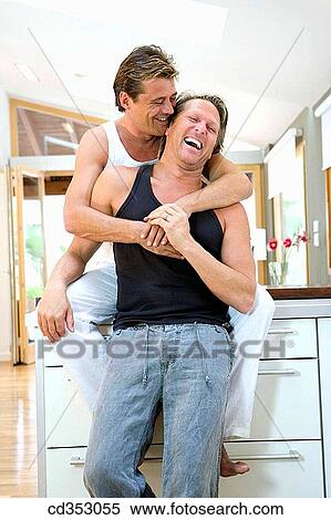 amusement, bond, at-home, apartment, affection View Large Photo Image Stock Photography - amusement, bond, at-home, apartment, affection. Fotosearch
