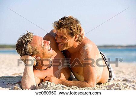Stock Image - amusement, bond, beach, attraction, affection. Fotosearch