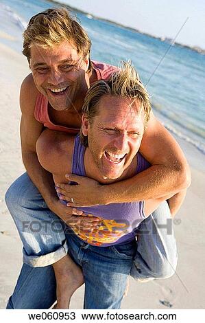 amusement, bonding, bond, beach, affection View Large Photo Image Stock Image - amusement, bonding, bond, beach, affection. Fotosearch