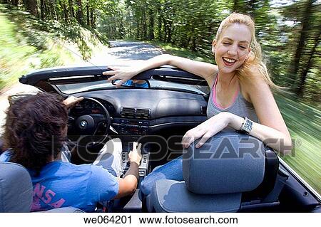 Stock Image - amusement, car, blurred motion, automobile, 20's. Fotosearch
