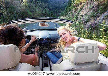 Stock Photo - amusement, car, blurred motion, automobile, 20's. Fotosearch