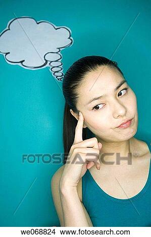 amusing, blank, Asian, 20's View Large Photo Image Picture - amusing, blank, Asian, 20's. Fotosearch