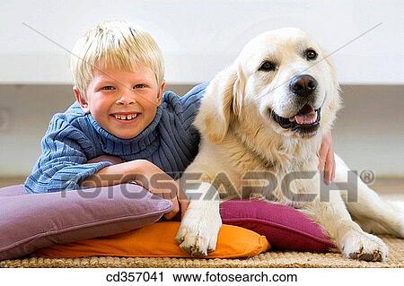 animal, boy, blond, at-home, affection View Large Photo Image Stock Image - animal, boy, blond, at-home, affection. Fotosearch