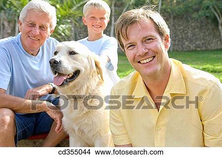 animal, child, boy, 3 generations View Large Photo Image Picture - animal, child, boy, 3 generations. Fotosearch