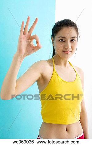 approval, contemporary, Asian, 20's View Large Photo Image Stock Photograph - approval, contemporary, Asian, 20's. Fotosearch