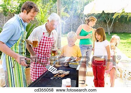 apron, barbeque, barbecue, 3 generations View Large Photo Image Stock Photo - apron, barbeque, barbecue, 3 generations. Fotosearch