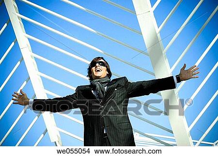architecture, business, black hair, Arms open, 30's View Large Photo Image Picture - architecture, business, black hair, Arms open, 30's. Fotosearch
