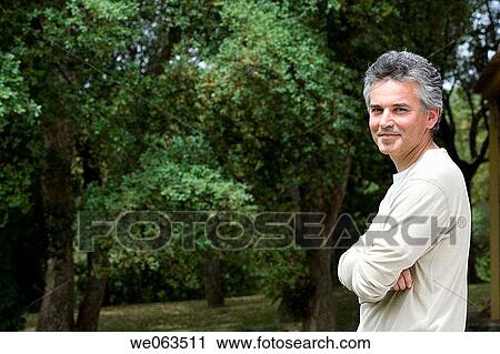 arms folded, calm, baby boomer, Arms crossed View Large Photo Image Stock Image - arms folded, calm, baby boomer, Arms crossed. Fotosearch