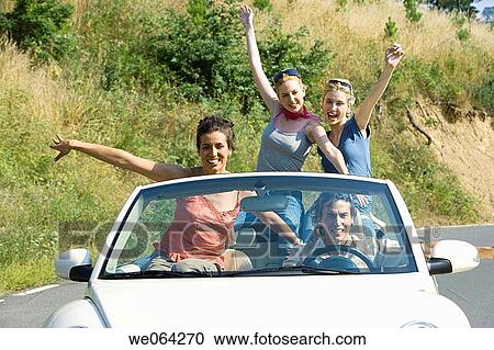 Arms open, automobile, Arms raised, amusement View Large Photo Image Stock Image - Arms open, automobile, Arms raised, amusement. Fotosearch