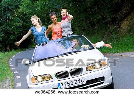 Stock Photograph - Arms open, car, automobile, amusement. Fotosearch