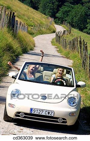 Arms raised, car, automobile, amusement View Large Photo Image Stock Photo - Arms raised, car, automobile, amusement. Fotosearch