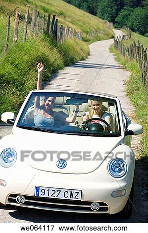 Arms raised, car, automobile, amusement View Large Photo Image Stock Photo - Arms raised, car, automobile, amusement. Fotosearch