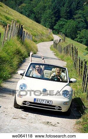 Arms raised, car, automobile, amusement View Large Photo Image Stock Photo - Arms raised, car, automobile, amusement. Fotosearch