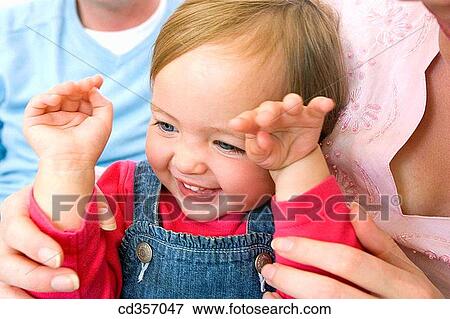 Arms raised, child, baby, amusement View Large Photo Image Stock Photo - Arms raised, child, baby, amusement. Fotosearch