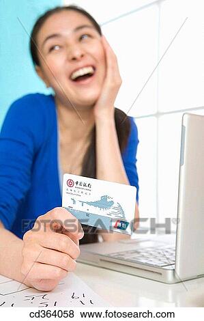 Asian, banking, Bank card, bank, 20's View Large Photo Image Stock Photo - Asian, banking, Bank card, bank, 20's. Fotosearch
