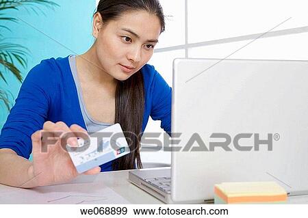 Asian, banking, Bank card, bank, 20's View Large Photo Image Stock Photo - Asian, banking, Bank card, bank, 20's. Fotosearch