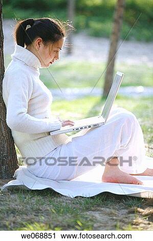 Asian, calm, barefoot, 20's View Large Photo Image Stock Image - Asian, calm, barefoot, 20's. Fotosearch