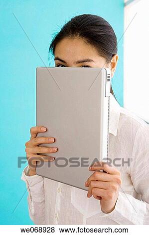 Asian, carrying, carry, business, 20's View Large Photo Image Stock Photo - Asian, carrying, carry, business, 20's. Fotosearch